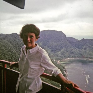 Carolyn ignores the view from the platform where the cable car passengers disembarked.