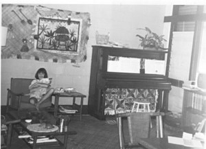 The piano was old and out of tune but much played. Covered in tapa cloth, it became a focal point of the living room. Somewhere along the way, we also got a cat.