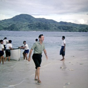 Larry exiting a longboat (called a tulula) but this is not Manu'a. The eagle eyes of George Hastings identify it as Aunu'u. But same general idea.